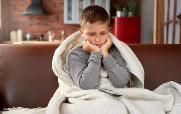 صورة تعبّر عن طفل ليس بصحة جيدة