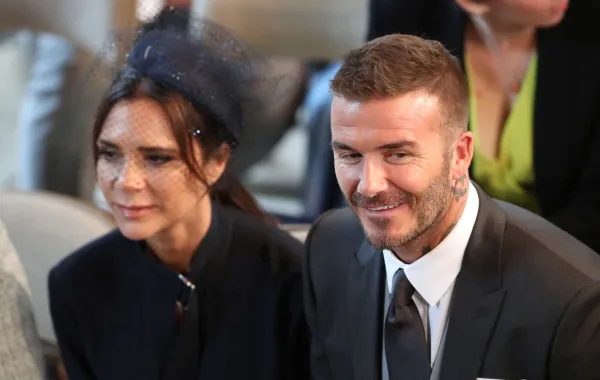 ديفيد وفيكتوريا بيكهام في كنيسة سانت جورج، قلعة وندسور، في وندسور (David and Victoria Beckham in St George's Chapel, Windsor Castle, in Windsor). مصدر الصورة: Danny Lawson / POOL / AFP