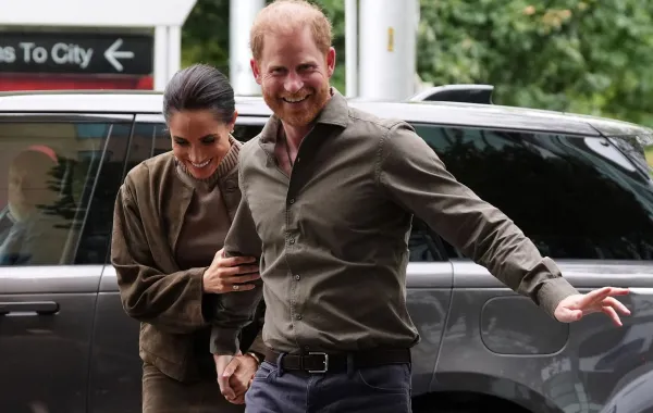 الأمير هاري وزوجته ميغان في ملبورن ( Prince Harry and his wife Meghan in Melbourne). مصدر الصورة: Jonathan Brady / POOL / AFP