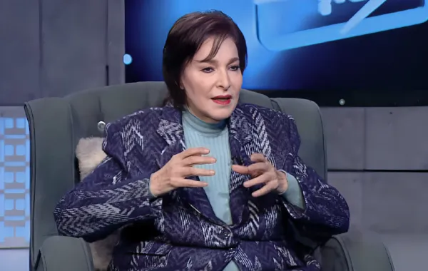 نادية رشاد - الصورة من شاشة عرض أحد البرامج