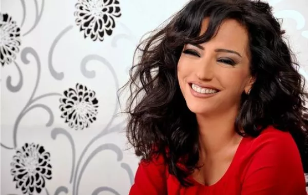 أمل عرفة تغني وتكتب لسوريا بتوقيع مروان خوري