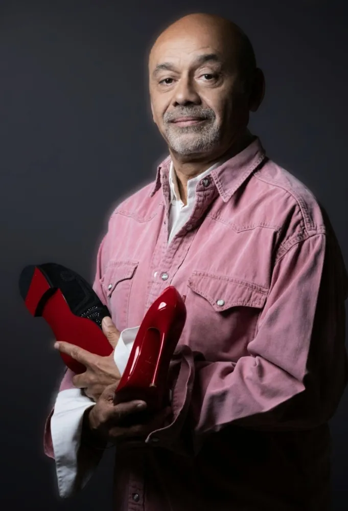 المصمم كريستيان لوبوتان Christian Louboutin- (مصدر الصورة JOEL SAGET / AFP)