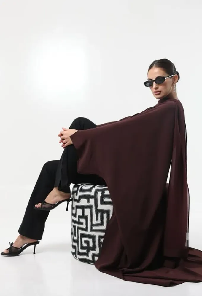 عباية خوخية من علامة Ao By Asma- الصورة من حساب الدار على إنستغرام